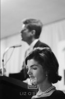 Kennedy, Jackie with JFK at Podium, 1959
