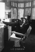 Audrey Hepburn with Feet Up in Dressing Room, Head Forward, 1953