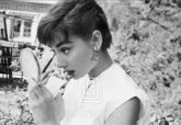 Audrey Hepburn Putting on Makeup in Mirror, 1953
