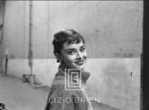 Audrey Hepburn in Grey Turtleneck Sweater, Glances Right Smiling, Head Tilted, 1953