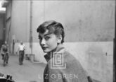 Audrey Hepburn in Grey Turtleneck Sweater, Glances Back, 1953