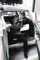 Audrey Hepburn Exits Studio Car, 1953