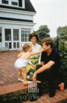 Kennedy, John F. and Jackie and Caroline on Patio, 1958
