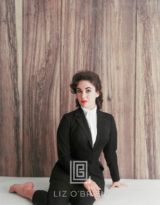 Elizabeth Taylor Black Suit, Sits to the Side, 1956