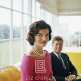 Kennedy, Jackie in Pink with JFK in Yellow Room,  Angle, 1959