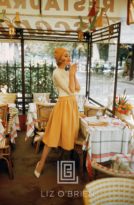 Model in Yellow in Paris Café, 1957