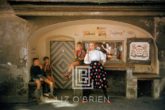Model in Salzberg Bakery with Three Boys, 1956