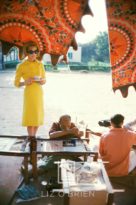 Tiger Morse in Yellow Suit Watches Sewing, 1962